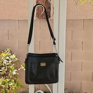 Rosetti black crossbody handbag with adjustable strap.